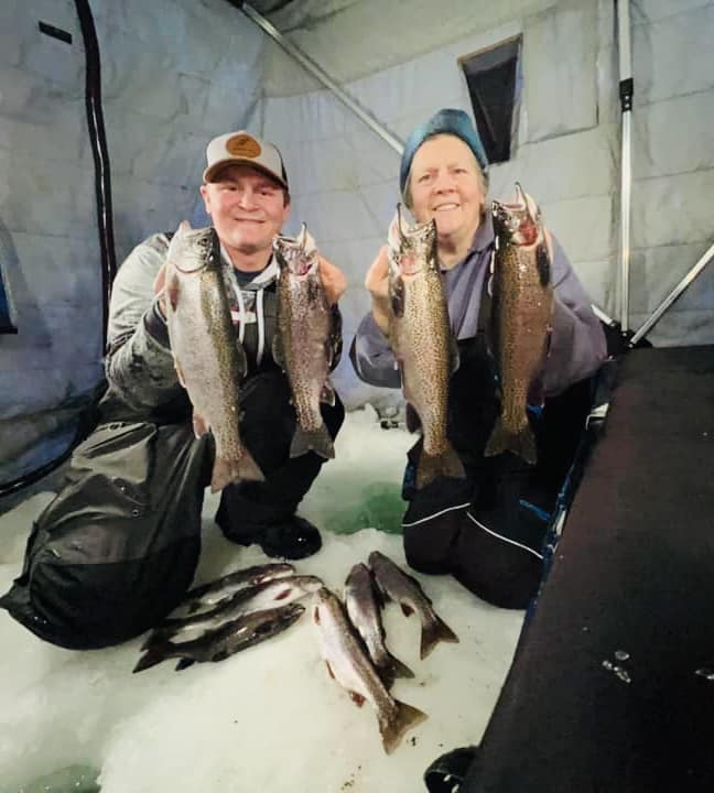 Jaret Baker and Shari Baker of Gunflint Pines ice fishing